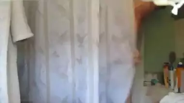 Mature MILF dress change..