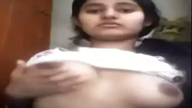 Cute girl fondles boobs on webcam