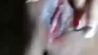 Chubby Indian girl fingering her wet pussy