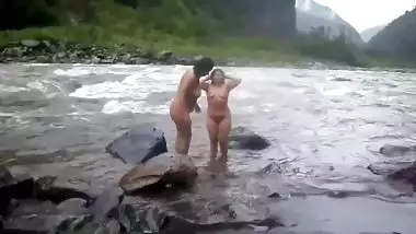 Two fat Desi women show their XXX assets while relaxing naked in river