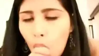 Gorgeous Indian babe sucking her loverâ€™s cock
