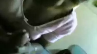 Bangladeshi couple in park while man playing...