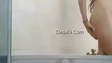 Desi teen gets naked on camera but never opens face hidden under fabric