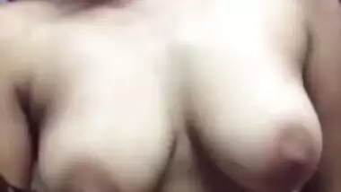 Slinky young Desi woman takes sex bra down and flaunts her XXX boobs
