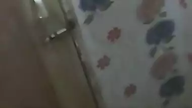 Attractive Desi girl changes in bathroom without knowing about cam