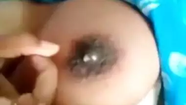 Desi Bhabhi's milking tits exposed in the close-up self-made XXX video